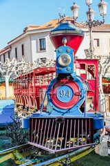 Fototapeta na wymiar attraction train on cervantes square in the city of alcala de henares