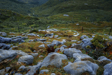 spellbinding landscape of Norwegian nature with high charming mountains and hills in which it is impossible not to fall in love