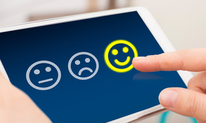customer marking smiley face in customer satisfaction survey