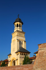 Fototapeta na wymiar Bell tower of The Coronation Cathedral in Alba Iulia, Romania