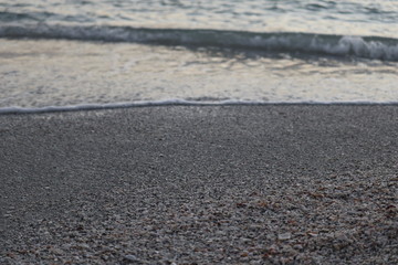 sand, shells and water