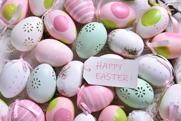 easter background with colorful eggs and greetings