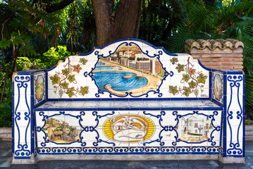 Traditional Spanish bench, decorated with beautiful Andalusian ceramics. Marbella, Spain