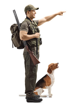 Hunter With A Dog Pointing