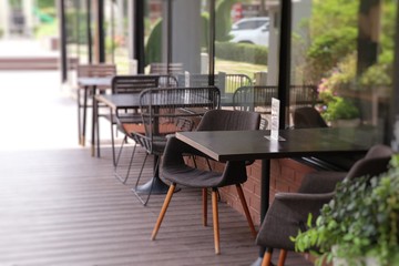 Tables and chairs in restaurants