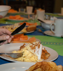 chilaquiles with eggs and papaya in Mexico