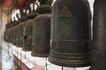 Close up of old iron bell in the temple
