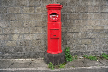 Amami Oshima, Japan - April 6, 2019: Red Post Box in Amami Oshima, Kagoshima, Japan