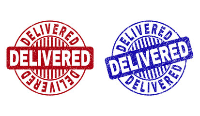 Grunge DELIVERED round stamp seals isolated on a white background. Round seals with grunge texture in red and blue colors. Vector rubber watermark of DELIVERED title inside circle form with stripes.