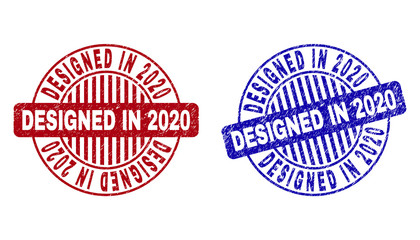 Grunge DESIGNED IN 2020 round stamp seals isolated on a white background. Round seals with grunge texture in red and blue colors.