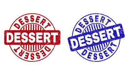 Grunge DESSERT round stamp seals isolated on a white background. Round seals with grunge texture in red and blue colors. Vector rubber imprint of DESSERT title inside circle form with stripes.