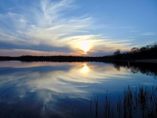Fototapeta na wymiar reflection of sunset on lake