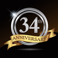 34th anniversary logo, with shiny silver ring and gold ribbon isolated on black background. vector design for birthday celebration.