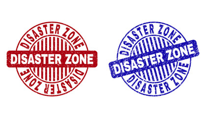Grunge DISASTER ZONE round stamp seals isolated on a white background. Round seals with grunge texture in red and blue colors.