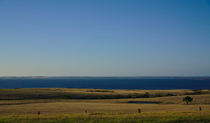 Distant view of sea and blue sky