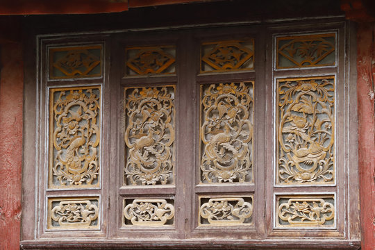 Carved wooden windows in the ancient city of Lijiang, Yunnan, China