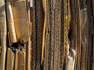 Pressed used boxes. Processing of secondary raw materials. Cardboard for reuse