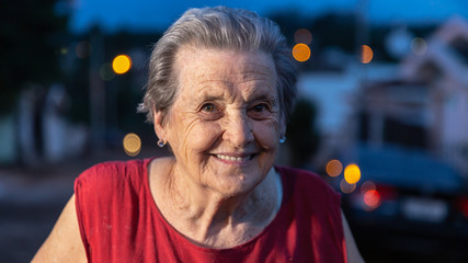 Beautiful older woman laughing and smiling. Smiling elderly woman.