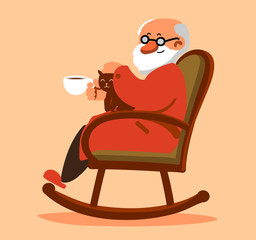 Relaxed old man with white beard sitting in rocking chair and drinking coffee or tea