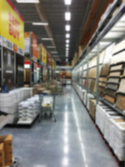 Fototapeta na wymiar Box blurred warehouse department at hardware store ,blur image.