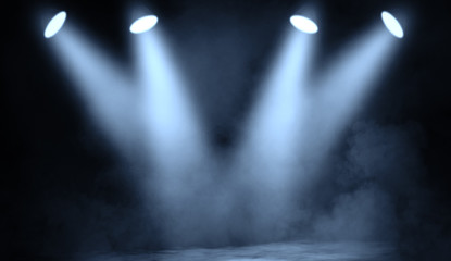 Blue studio spotlight . Stage with smoke on the floor - obrazy, fototapety, plakaty