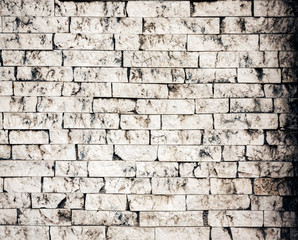 Old white dirty brick wall background.
