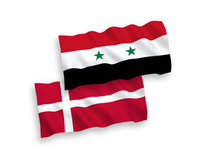 National vector fabric wave flags of Denmark and Syria isolated on white background. 1 to 2 proportion.