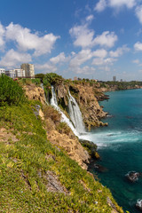 Fototapeta na wymiar Waterfall on the sea