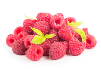 Raspberry with leaves isolated on white background