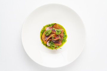 creative beef tartare on the black plate
