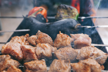 Barbecues on the grill on the background of hot coals