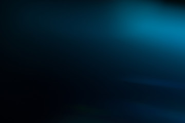 Lens flare effect. Soft defocused blurred light shine on dark blue background - Powered by Adobe