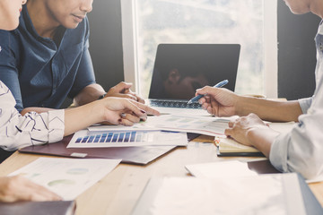 Fototapeta premium Business meeting concept; Business people and staff meeting in office to briefing strategy information of corporate; Strategy Department in corporate brainstorming at meeting room