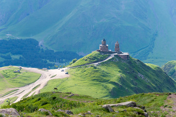 Kazbegi, Georgia - Jun 29 2018: Gergeti Trinity Church. a famous landscape in Kazbegi, Mtskheta-Mtianeti, Georgia.