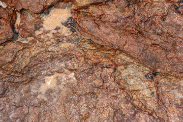.top view of wave hit rock on the beach texture of rock when it wet and dry