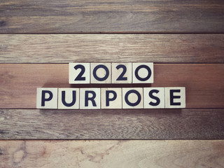 New Year purpose concept - 2020 PURPOSE  written on wooden blocks.