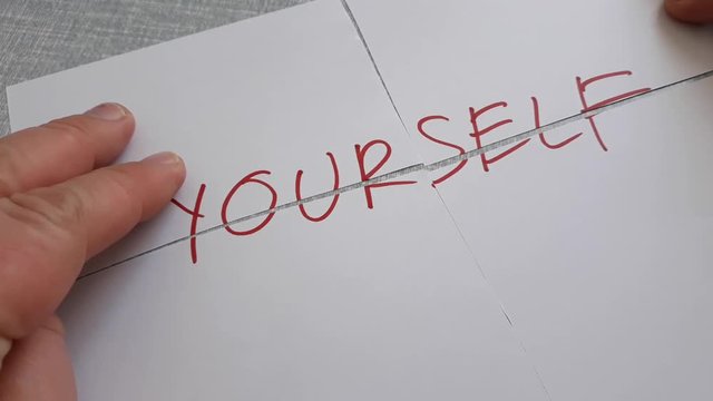 pull yourself together, bring your feelings under control and start acting normally; stop feeling sorry and start feeling confident paper sheet with word yourself pushing pulling in one piece