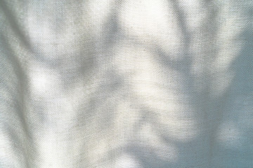 Naklejka premium Background, shiny leaves on fabric in Phuket, Thailand