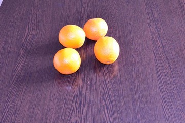 Oranges on the dining table.