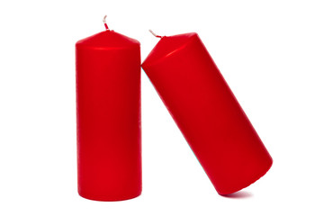 A selection of red candles on a white background