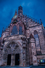 Fototapeta premium Close-up view of St. Vitus Cathedral against the blue sky. Prague, Czech Republic