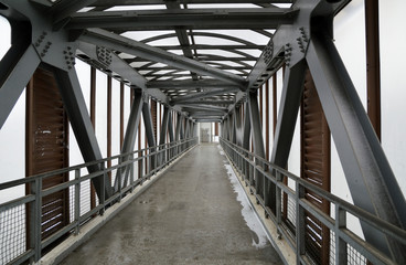 Empty footbridge (pedestrian crossing) in the afternoon in Moscow
