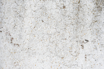 Wall fragment with scratches and cracks