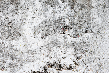 Wall fragment with scratches and cracks