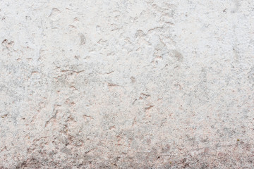 Wall fragment with scratches and cracks