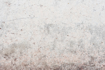 Wall fragment with scratches and cracks
