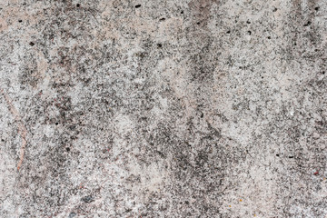 Wall fragment with scratches and cracks