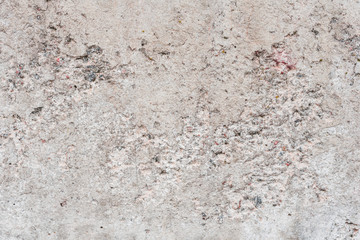 Wall fragment with scratches and cracks