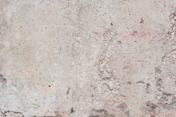 Wall fragment with scratches and cracks