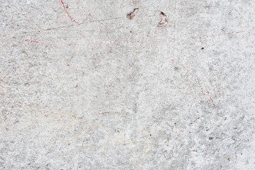 Wall fragment with scratches and cracks